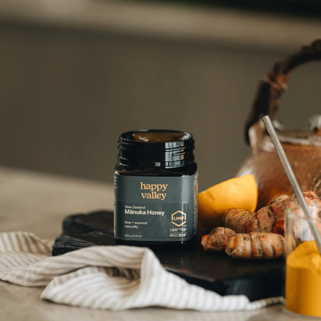 Happy Valley Mānuka Honey UMF 15+ jar on a kitchen bench