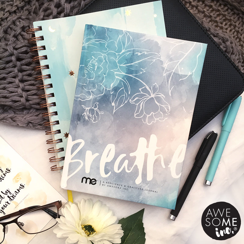 Resilient ME "Breathe" gratitude journal on a desk with stationery