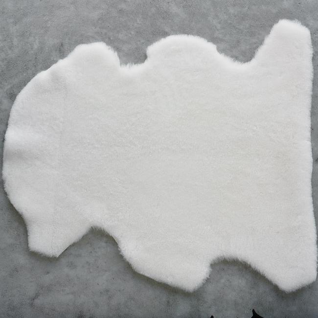 Close-up of short-wool Sleep Sheepskin Baby Rug