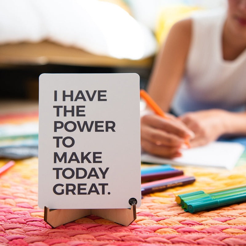 Positive Affirmations card reading "I have the power to make today great" on a stand