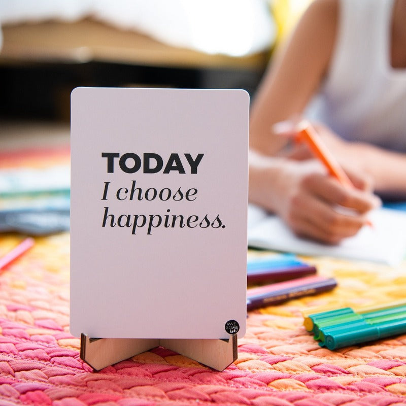 Positive Affirmations card reading "Today I choose happiness" on a stand