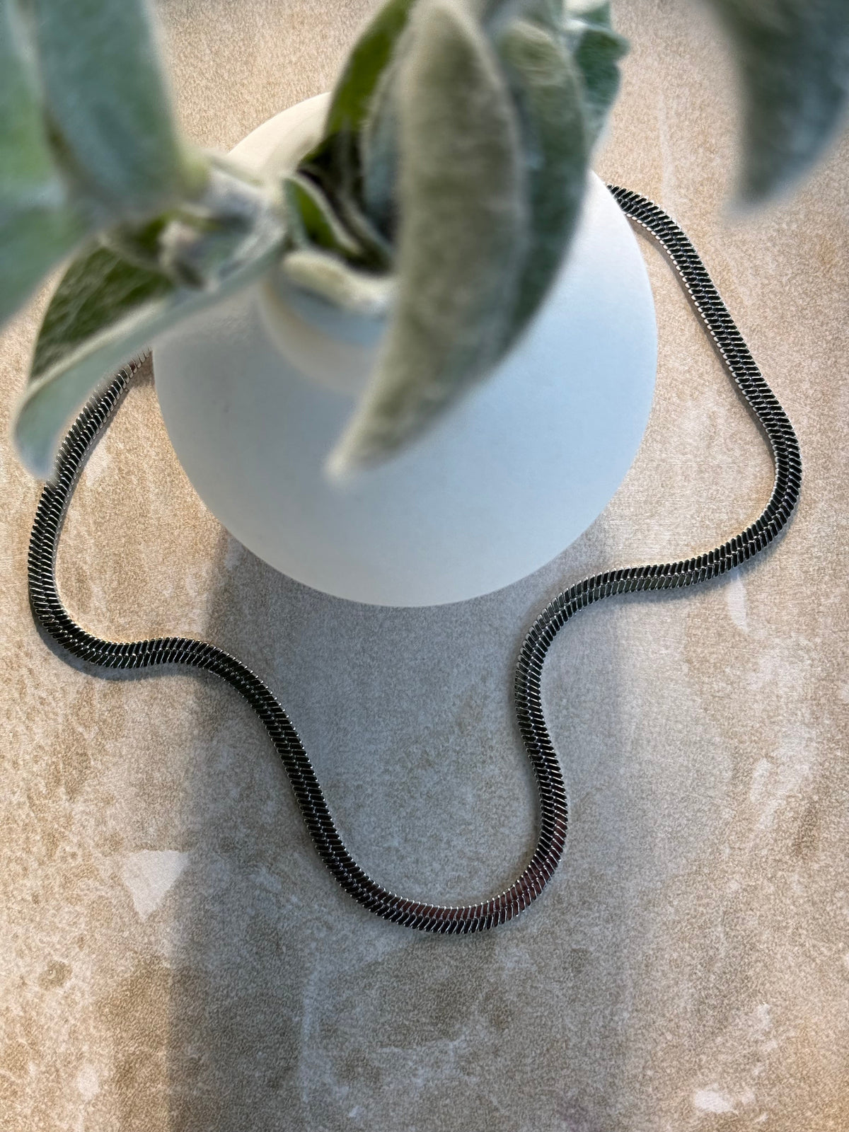 Kahuru Silver Blade Necklace on a black cord