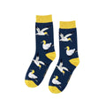 Pair of navy Barekind Save the Gannet bamboo socks with gannets and yellow heels, toes and cuffs