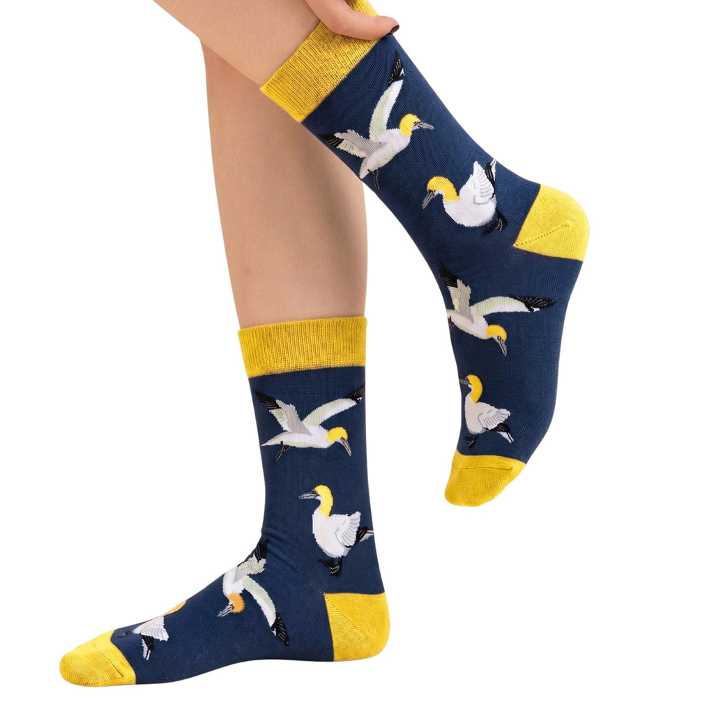 Person wearing Barekind Save the Gannet bamboo socks