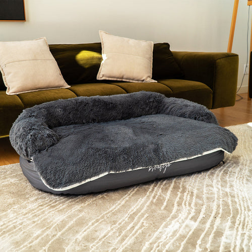 Brooklyn Luxe Lounger 2-in-1 dog bed with plush topper in a living room