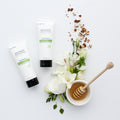 Just Peachy Body Lotion tubes with flowers and a honey dipper