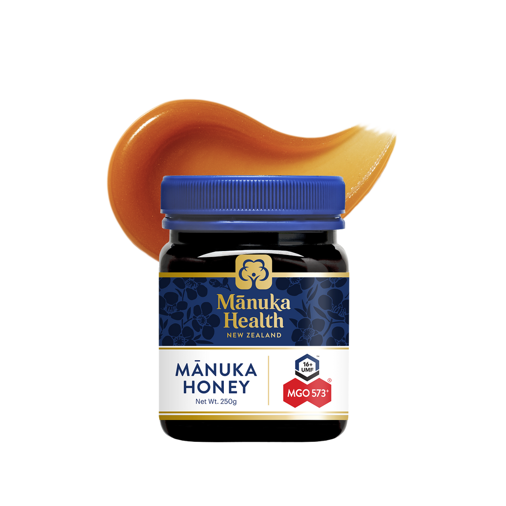 Manuka Health Original Manuka Honey MGO 573+ jar with a swirl of honey
