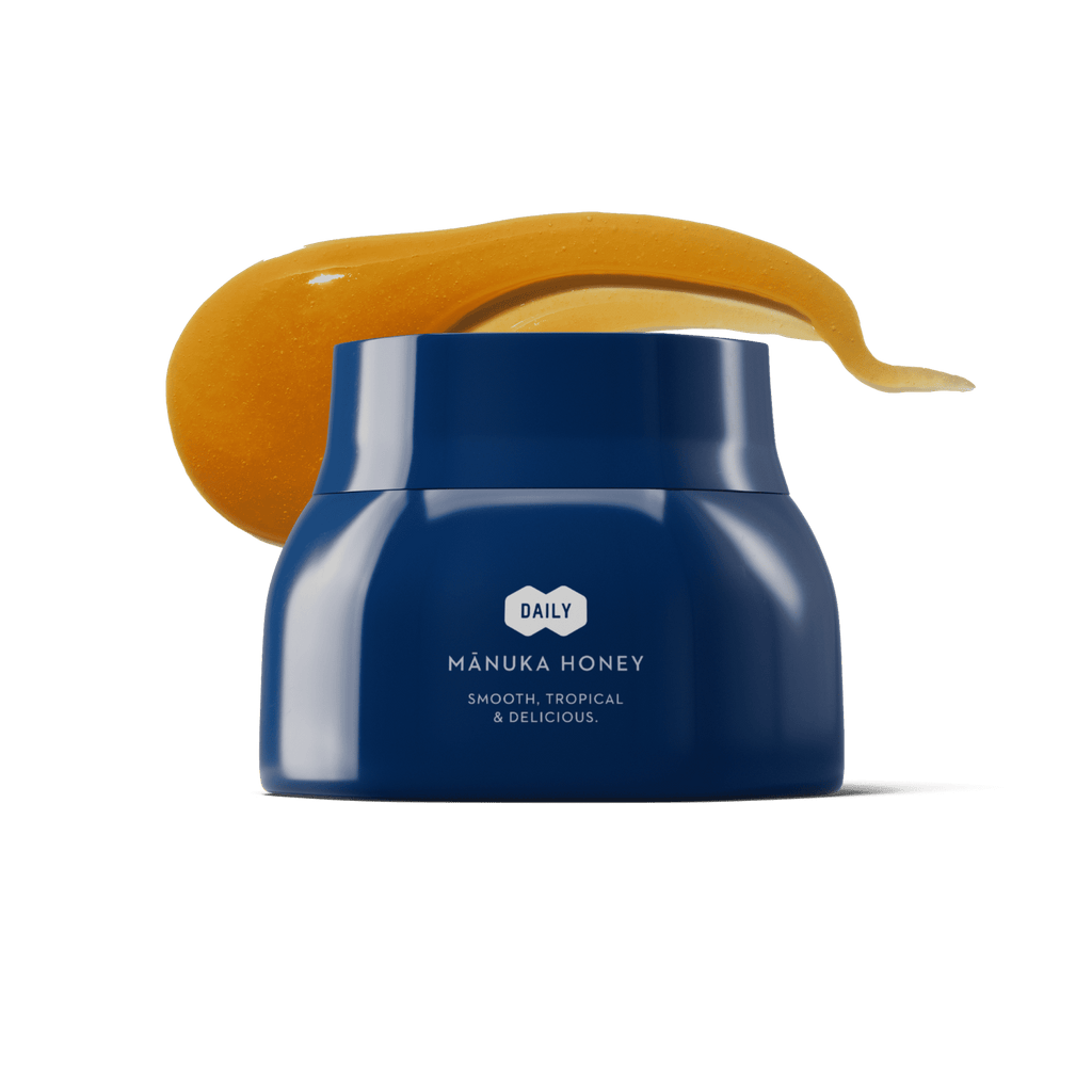 Manuka Health Daily Manuka Honey MGO 400+ jar with a swirl of honey