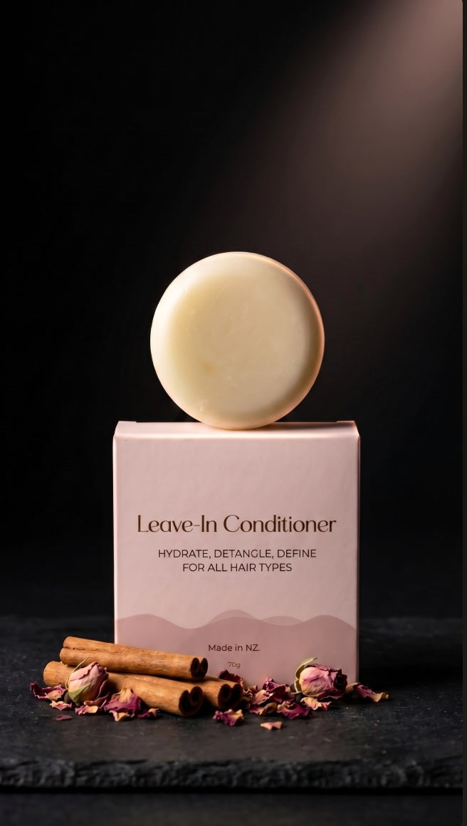 NaturalCare Leave-In Conditioner Bar on its box with dried flowers