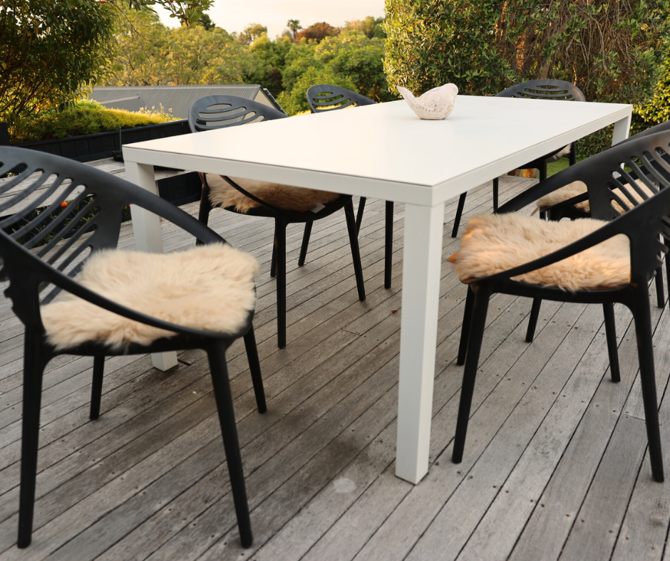 Classic Sheepskins seat pads on outdoor dining chairs