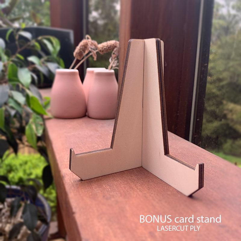 Wooden bonus card stand on an outdoor bench