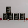 The Untamed Sanctuary collection: five Bumble & Birdie soy candles in amber glass jars