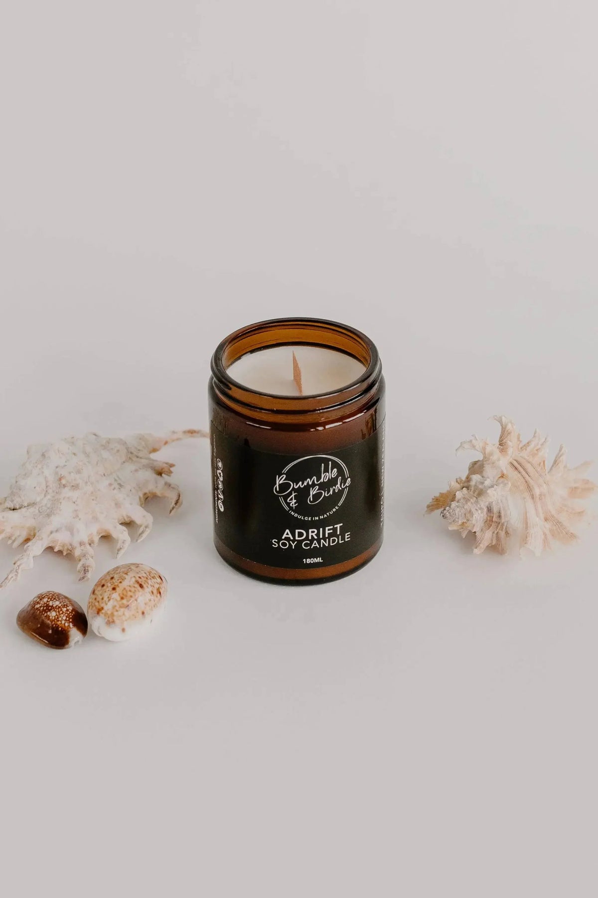 Adrift soy jar candle from the Winter Revival set, with shells