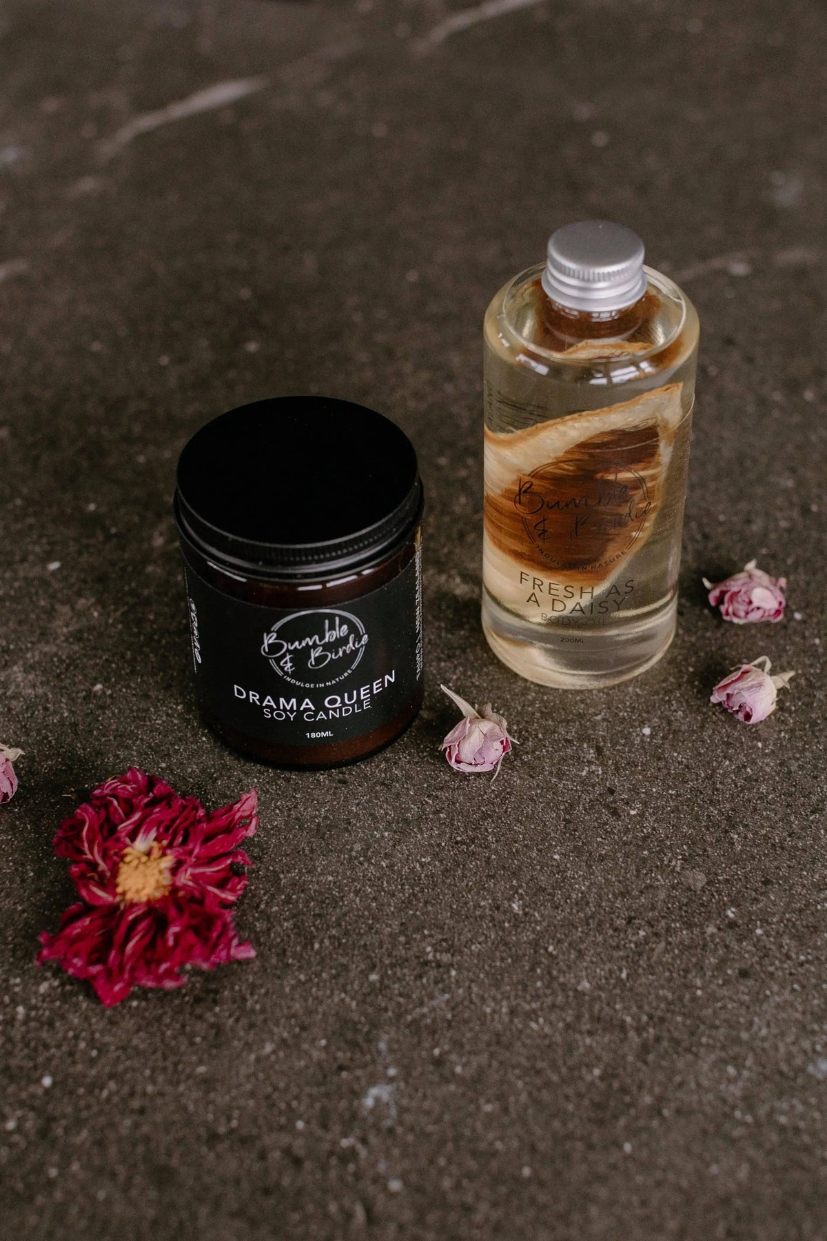 Pick Me Up set: Drama Queen jar candle and Fresh as a Daisy body oil with dried flowers