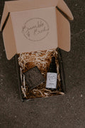 Elixir Master Beard Ritual Set in an open Bumble & Birdie box with beard oil and a shaving bar