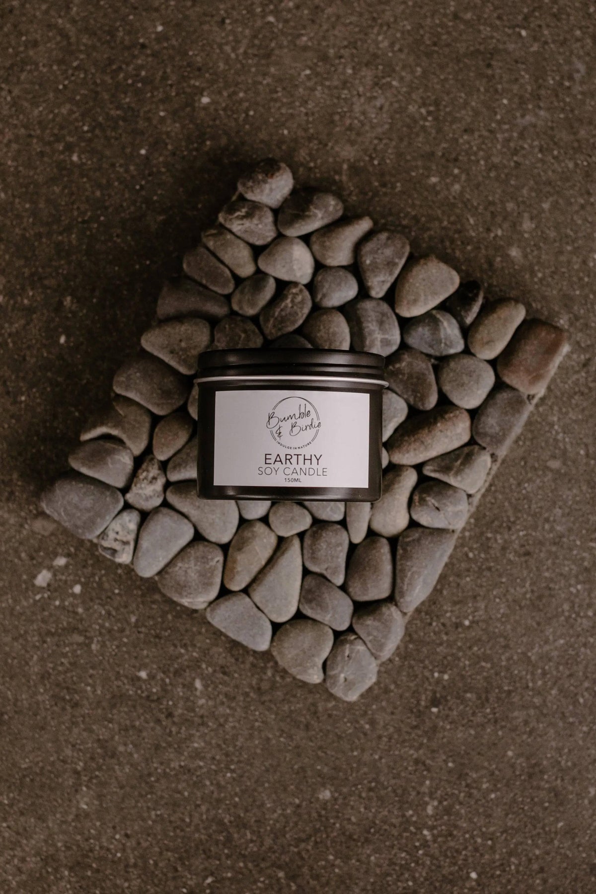 Bumble & Birdie soy tin candle on a small kōhatu stone mat from the Stone & Soy Retreat (iti) set