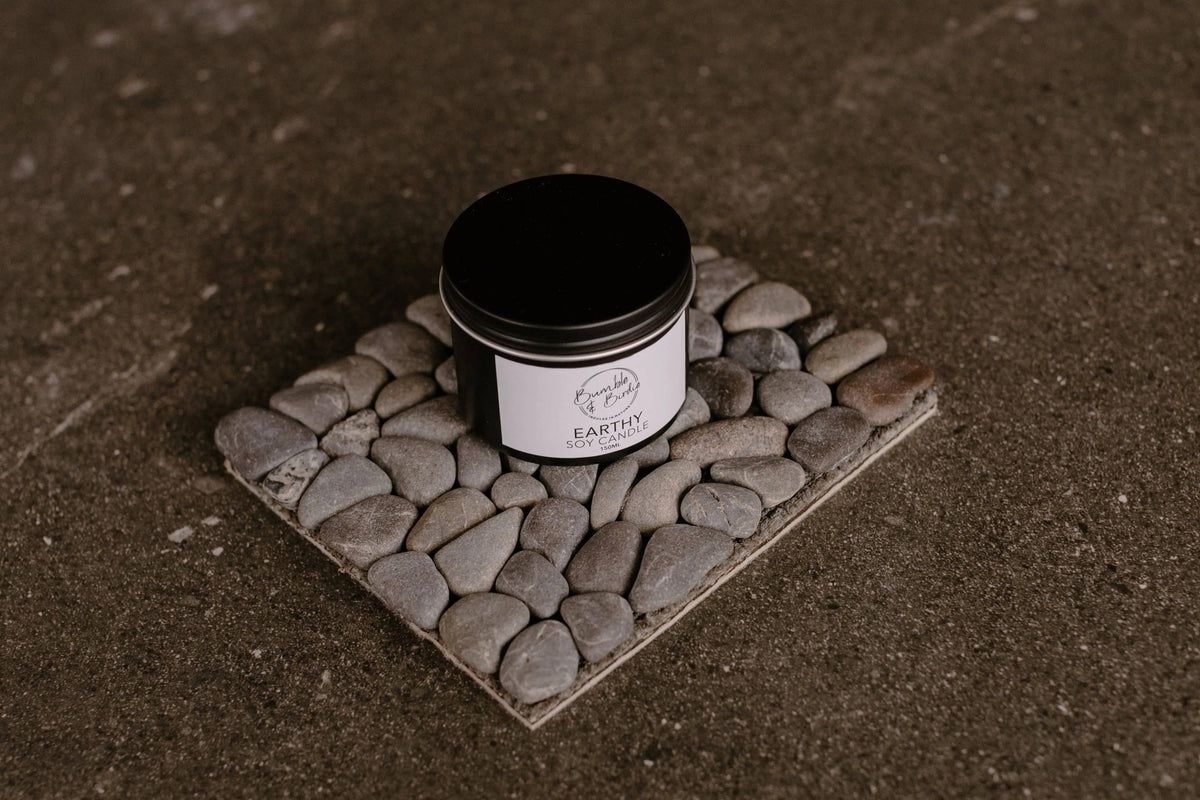 Stone & Soy Retreat (iti) gift set: soy tin candle on a square kōhatu stone mat