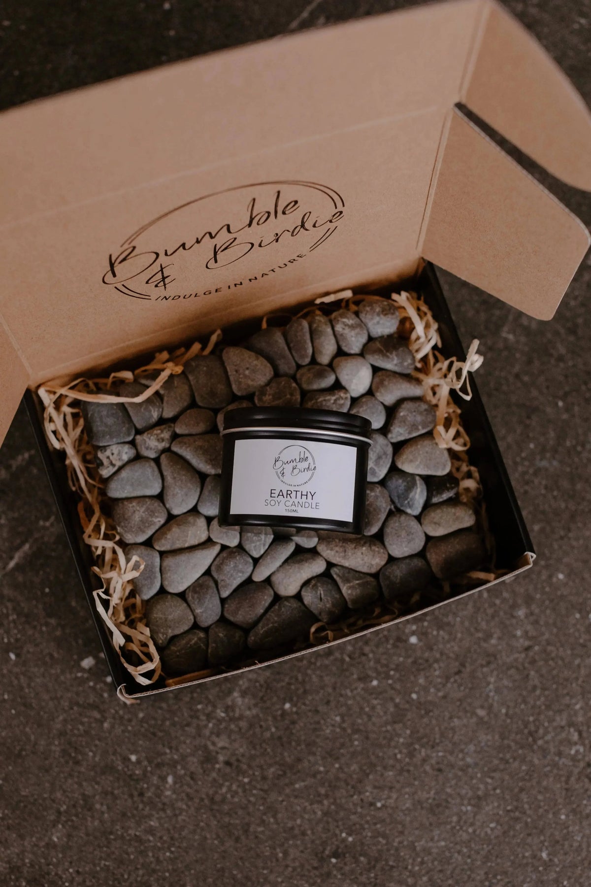 Stone & Soy Retreat (iti) gift set: a soy tin candle on a kōhatu stone mat in a Bumble & Birdie box