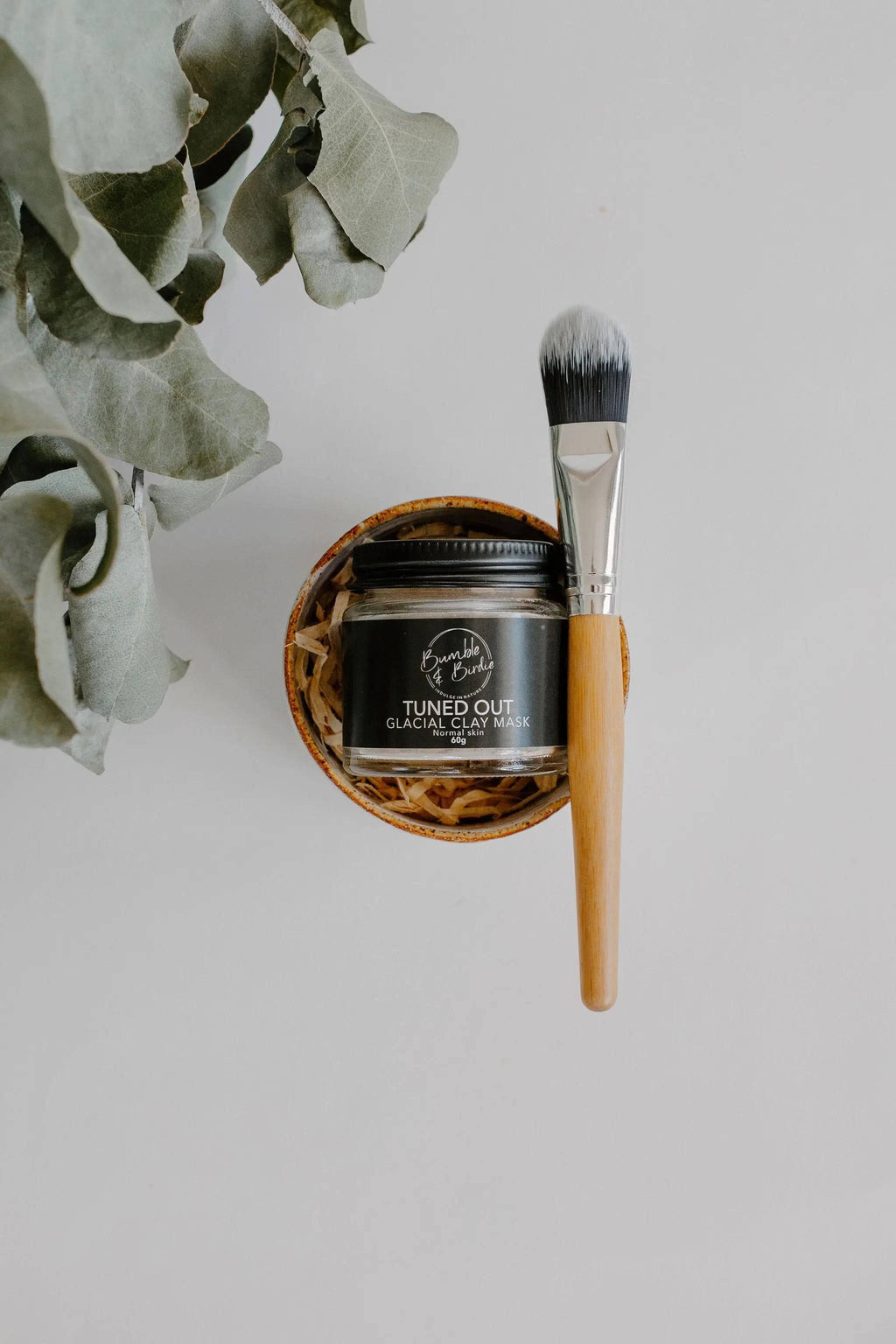 Clay Mask Ritual Set: Bumble & Birdie clay mask jar in a speckled clay pot with a mask brush