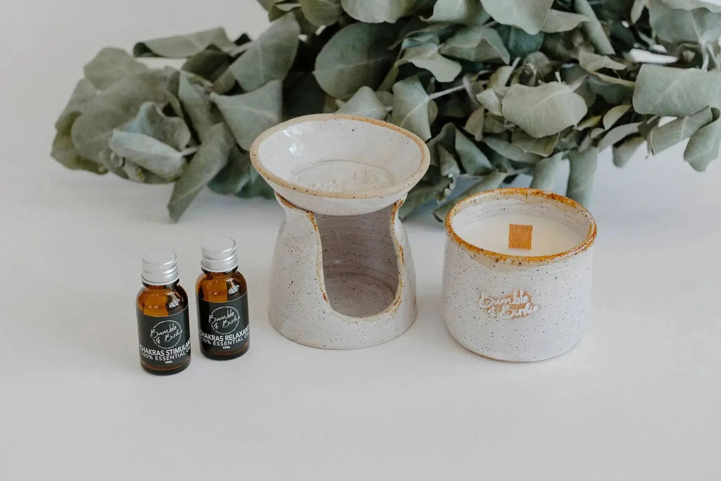 Elevate Your Frequency Aromatherapy Ritual Set with a clay diffuser, clay candle and two oil bottles