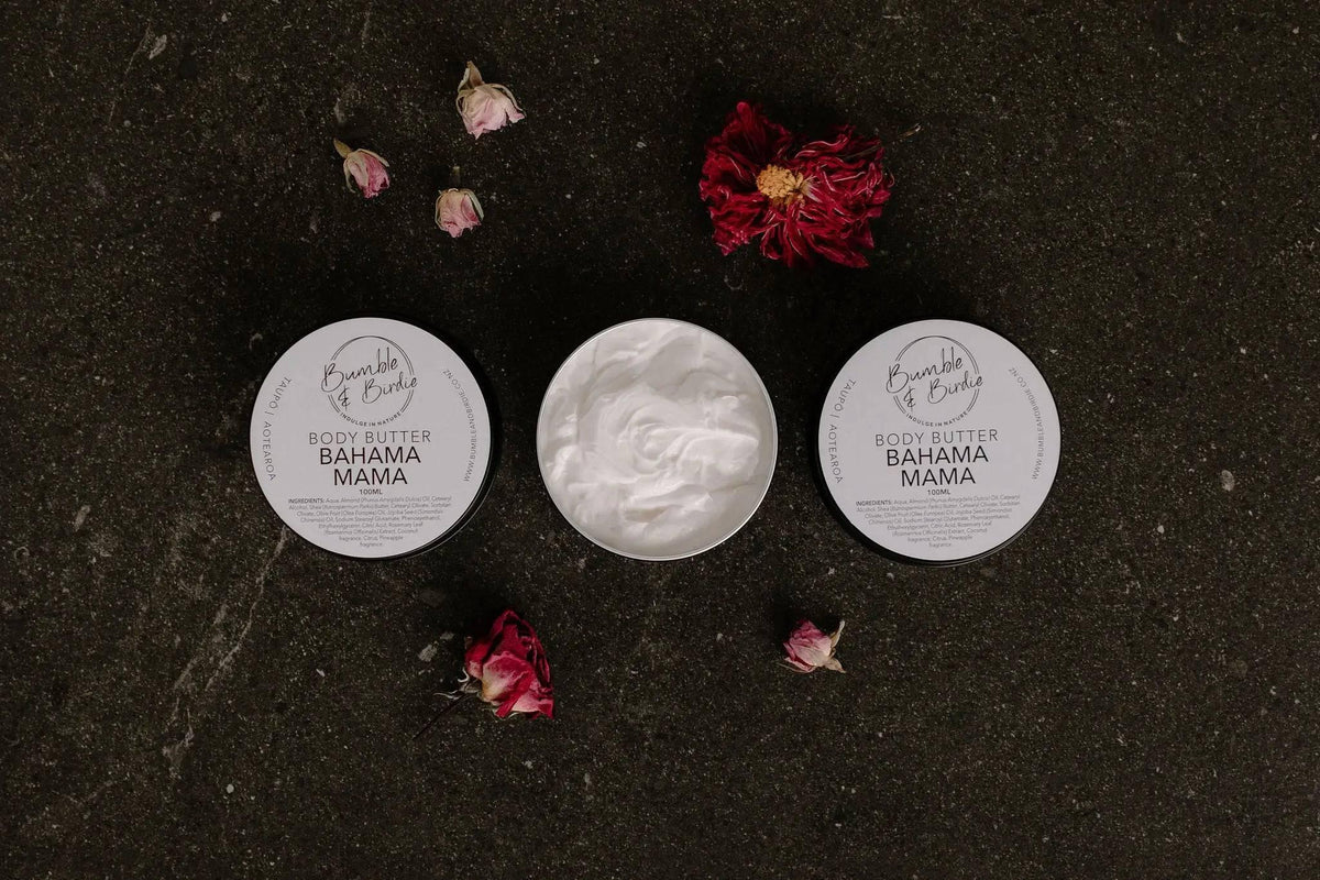 Two tins of Bahama Mama body butter and an open tin showing the whipped butter