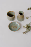 Earth Clay Pottery Essentials Set in green glaze: mask mixing bowl, brush holder and soap dish