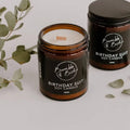 Birthday Suit soy candle in an amber glass jar by Bumble & Birdie, with eucalyptus