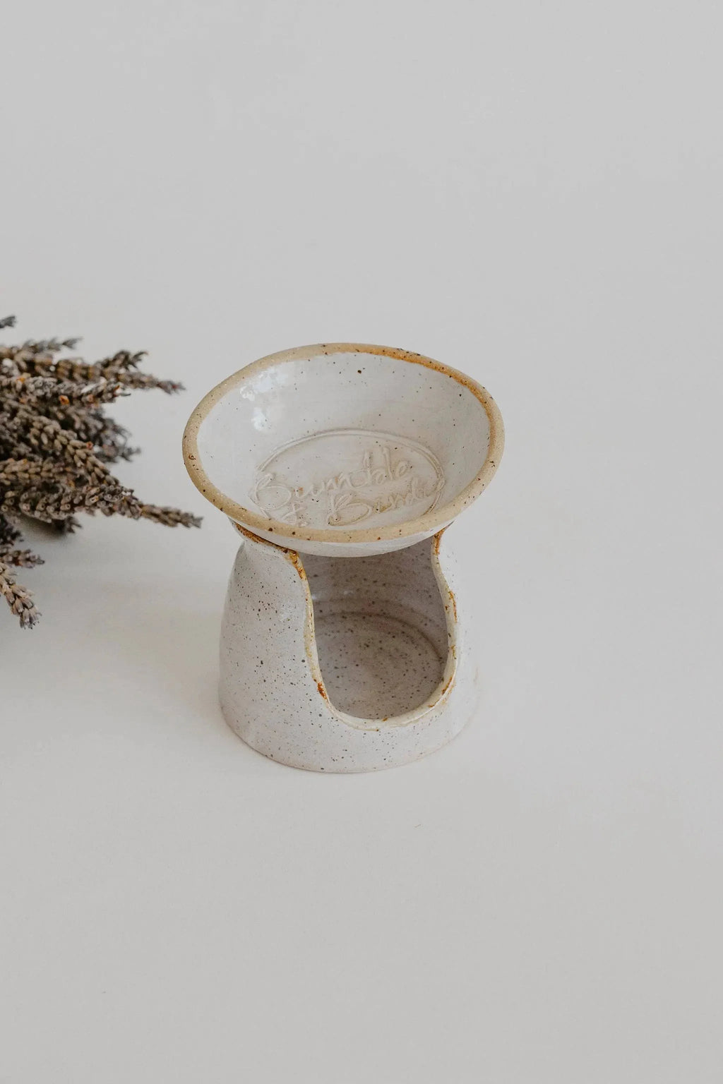 Alchemy oil diffuser in speckled cream clay with dried lavender