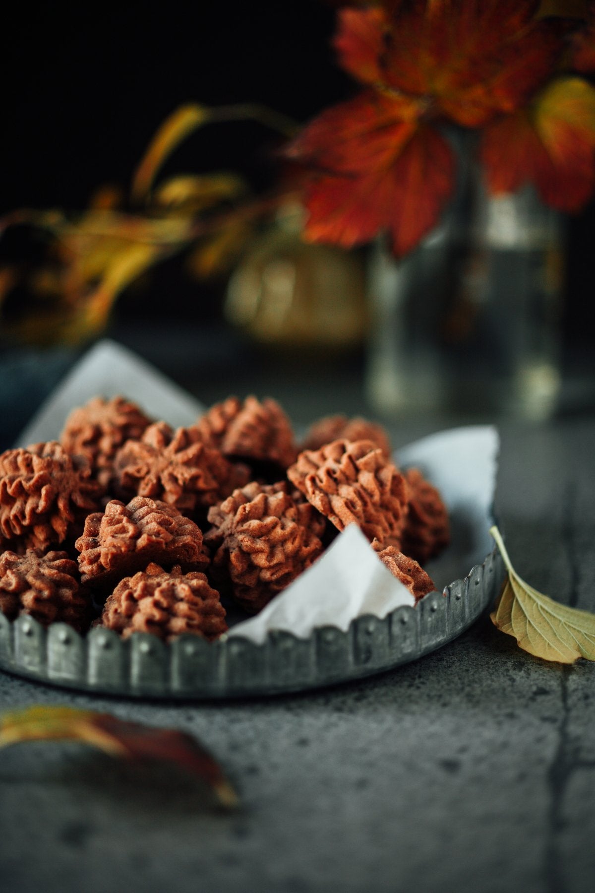 Lowrey Chocolate butter cookies on a dark dish with autumn leaves
