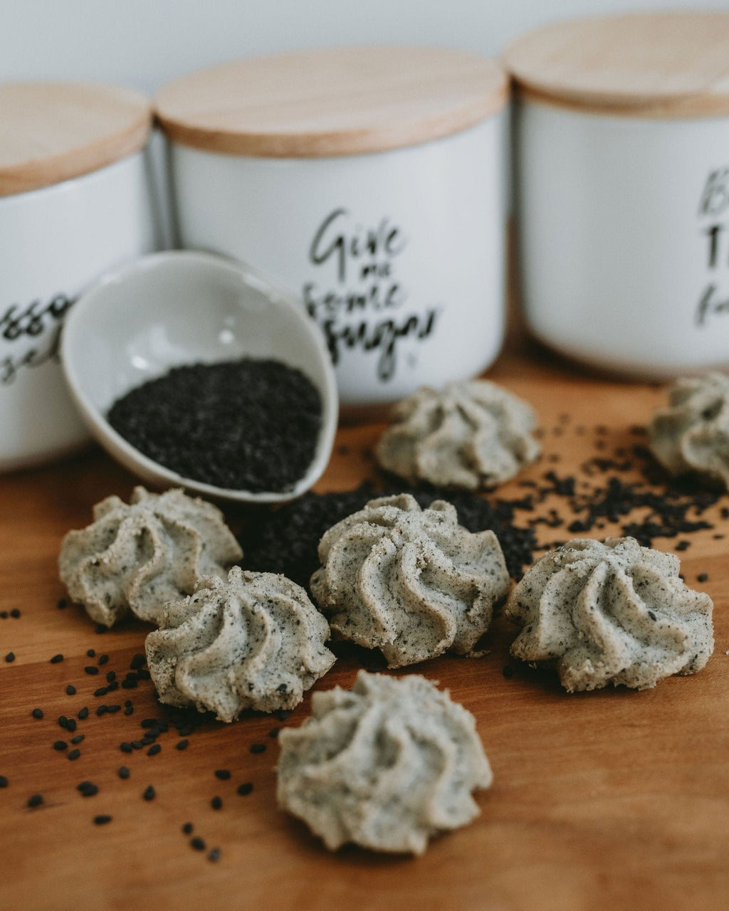 Lowrey Black Sesame butter cookies with a bowl of sesame seeds