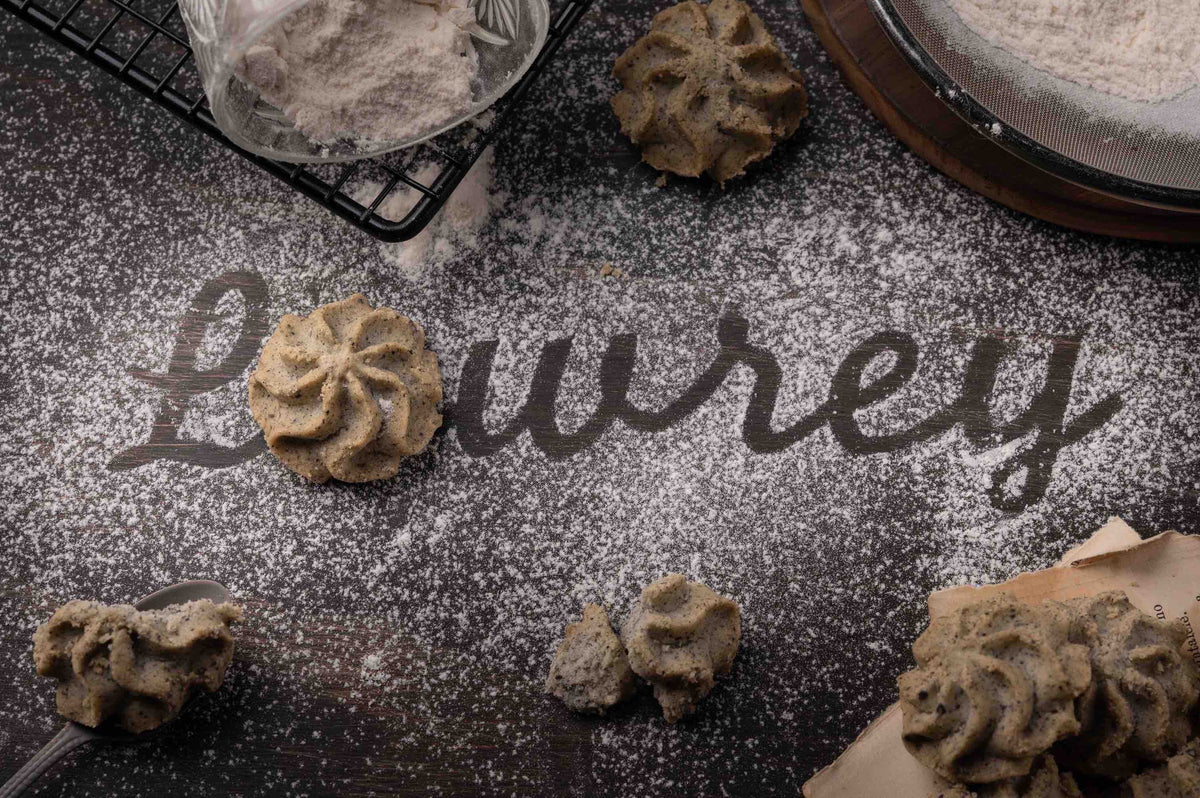 Lowrey Black Sesame butter cookies on dark sesame-dusted surface