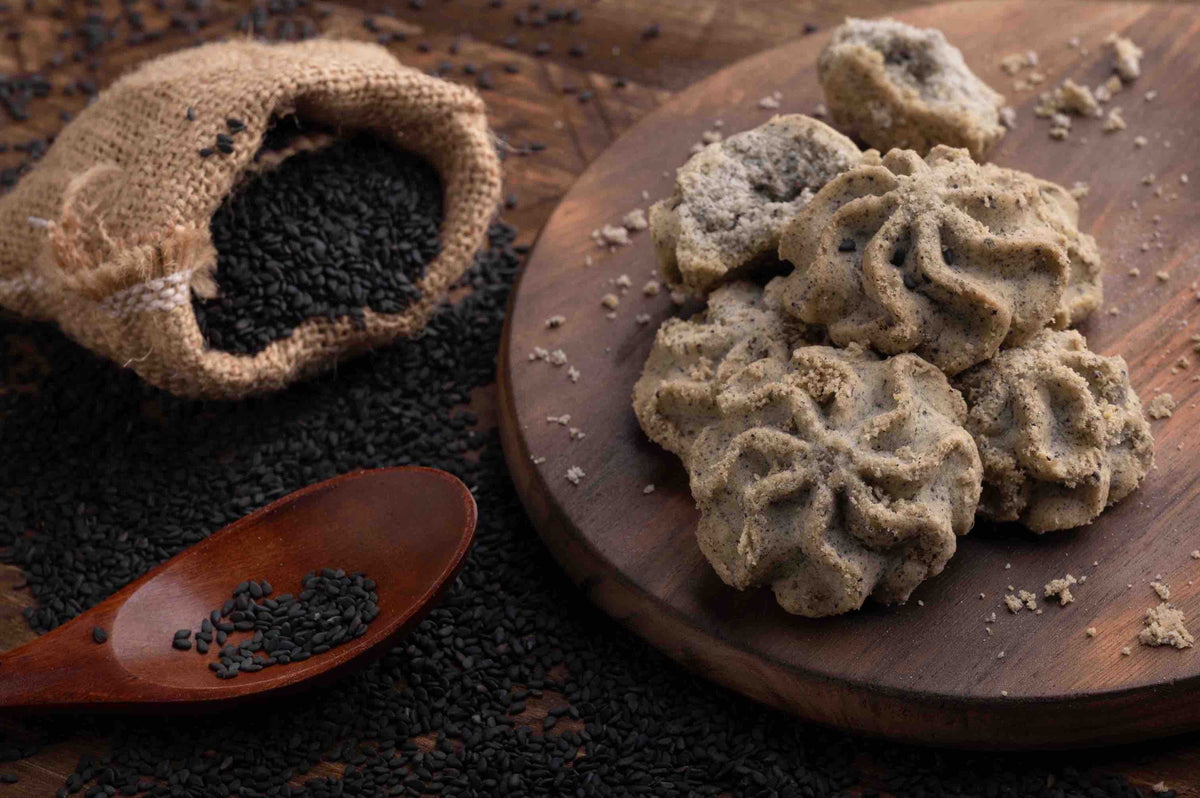 Lowrey Black Sesame butter cookies on a wooden board