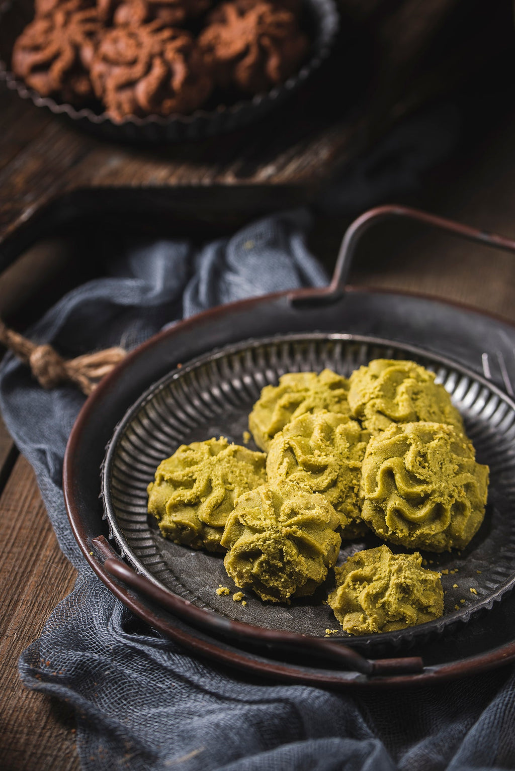 Lowrey Matcha butter cookies on a dark plate