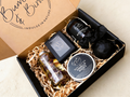 Vanilla Kisses Gift Set in an open Bumble & Birdie box with body butter, body oil, candle, bath bomb and soap