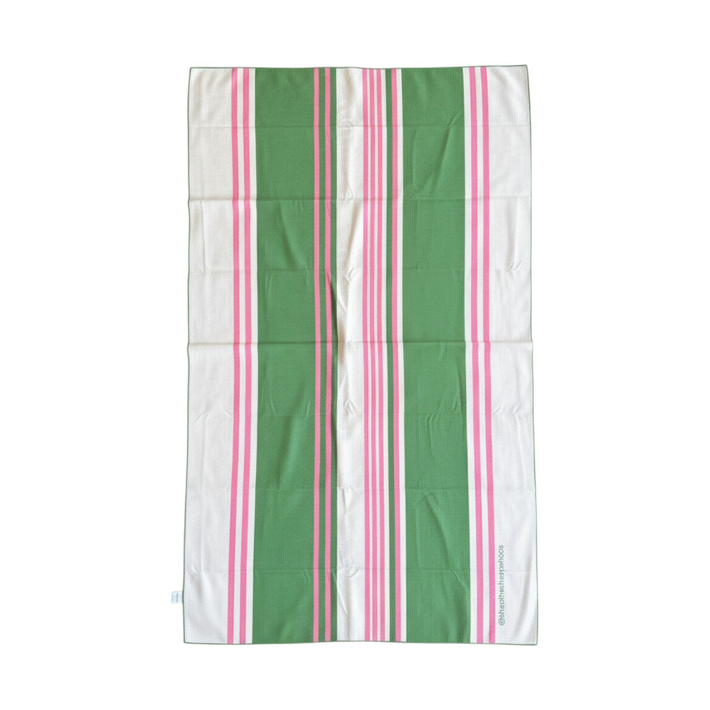 Green and pink striped Frankly Cotton beach towel laid flat